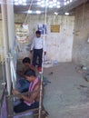 Indian weavers weaving carpet in Bhadohi India.