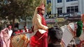 Indian wedding, Groom proceeding for Bride`s place sittng on a horse.