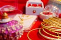 Indian wedding Jewellery sets on red cloth background. Royalty Free Stock Photo