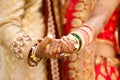 Indian wedding photography ,groom and bride hands