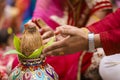 Indian wedding photography, Haldi ceremony groom hands