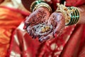 Indian wedding ritual bride hands holding jewellery