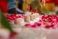 Indian wedding ritual, Maharashtrian Saptapadi on rose petales spread on floor Royalty Free Stock Photo