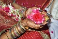 Indian wedding rituals with flower on hands Royalty Free Stock Photo