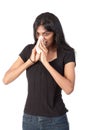Indian woman blowing her nose