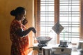 Indian woman cooking food in rural house Simple living