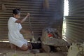 Indian woman cooking in kitchen at Coco River Royalty Free Stock Photo