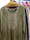 Indian woman fashion dress salwar kameez in display of shop