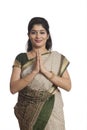 Indian woman giving the traditional welcome Royalty Free Stock Photo