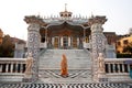 Indian woman goes in front of Temple