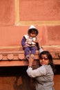 Indian woman with her baby in Red Fort, Agra