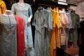 Indian woman latest fashion dress hung on hangers ,in display in a retail shop,in market. Indian Pakistani Bridal wedding Lehenga