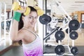 Indian woman lifting two dumbbells Royalty Free Stock Photo