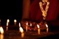 Indian Woman Lighting Candles At Diwali Night