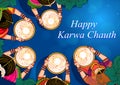 Indian woman looking moon through sieve during Karwa Chauth celebration