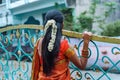 Indian woman looking at street - Indian girl wearing saree