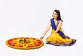 indian woman making rangoli using flowers Royalty Free Stock Photo