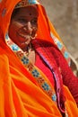 Indian woman with an orange vivid veil