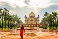 Indian woman overlooking the Tomb of Safdarjung in New Delh