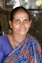 Indian woman preparing dosa at a kitchen, Auroville