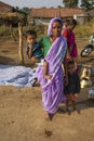 Indian Woman in Purple Sari with Children