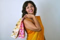 Indian woman in saree with shopping bags