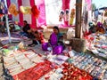 an indian woman seating at artificial jwellary shop at fair in India January 2020 Royalty Free Stock Photo