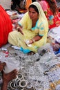 Indian woman selling bangels at Sadar Market, Jodhpur, India Royalty Free Stock Photo