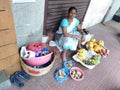 Indian woman selling fruit in the street. Panagi Panjim, Goa