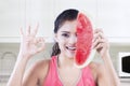 Indian woman with superfood in the kitchen Royalty Free Stock Photo