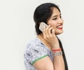 Indian woman is talking on the phone Royalty Free Stock Photo