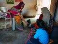 indian woman teaching about laptop technology at classroom in india January 2020