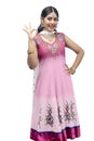 Indian woman in traditional Anarkali dress standing with OK gesture