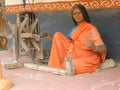 Indian woman weaving statue