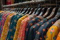 Indian womans fashion dresses displayed on hangers in a retail shop. Concept Indian fashion, Retail