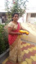 Indian Women of Maharashtra in cluture dress and praying items plates