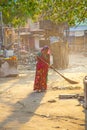 Indian women o fthe lowest caste scavenges the market place