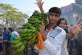 Indian women offering her prayers with fruits and bundle of bananas during the festival of Chhath Puja. Chh