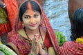 Indian women offering her prayers with fruits and bundle of bananas during the festival of Chhath Puja. Chh Royalty Free Stock Photo