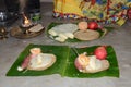 Indian women offering her prayers with fruits and bundle of bananas during the festival of Chhath Puja. Royalty Free Stock Photo