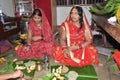 Indian women offering her prayers with fruits and chapati or bananas during the festival of Chhath Puja.
