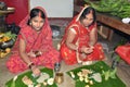 Indian women offering her prayers with fruits and chapati or bananas during the festival of Chhath Puja.