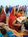 Indian women performing Chhath Pooja in Patna Bihar at Ganga Ghat