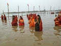 Indian women performing Chhath Pooja in Patna Bihar at Ganga Ghat