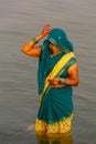 Indian women pray and devote for Chhath Puja festival on Ganges river side in Varanasi,India