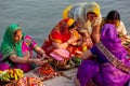 Indian women pray and devote for Chhath Puja festival on Ganges river side in Varanasi,India