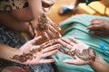 Indian women showing hand with henna tattoo art Mehndi Royalty Free Stock Photo