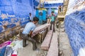 Indian worker carrying stones Royalty Free Stock Photo