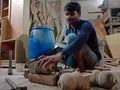 an indian worker making furniture at workshop, iron blade equipment aviable for wood chopping in factory in India January 2020 Royalty Free Stock Photo