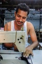 Indian worker sowing